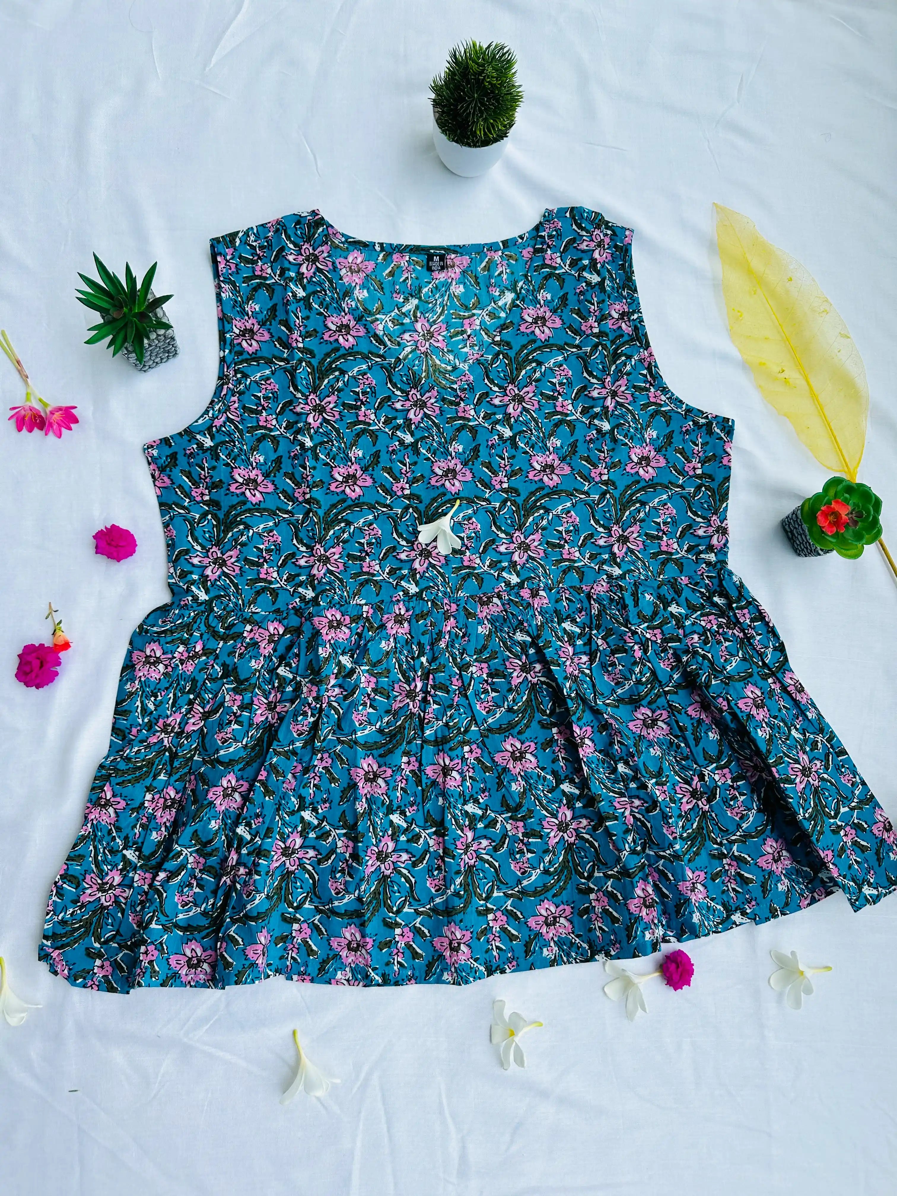 Breezy Elegance : Sky Blue Sleeveless Short Peplum Kurti