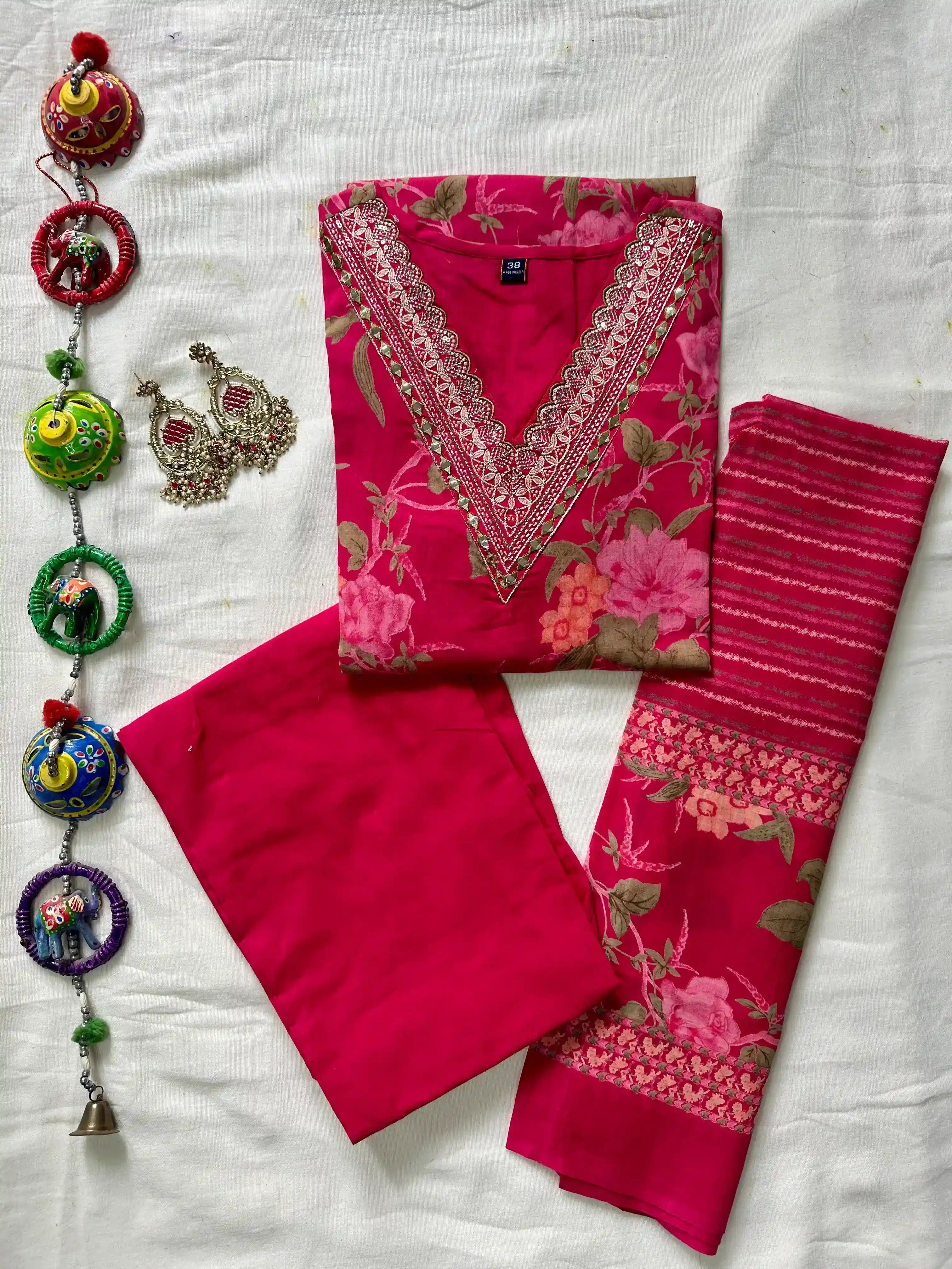 Enchanting Elegance : Magenta Colour Neck Embroidered Suit Set