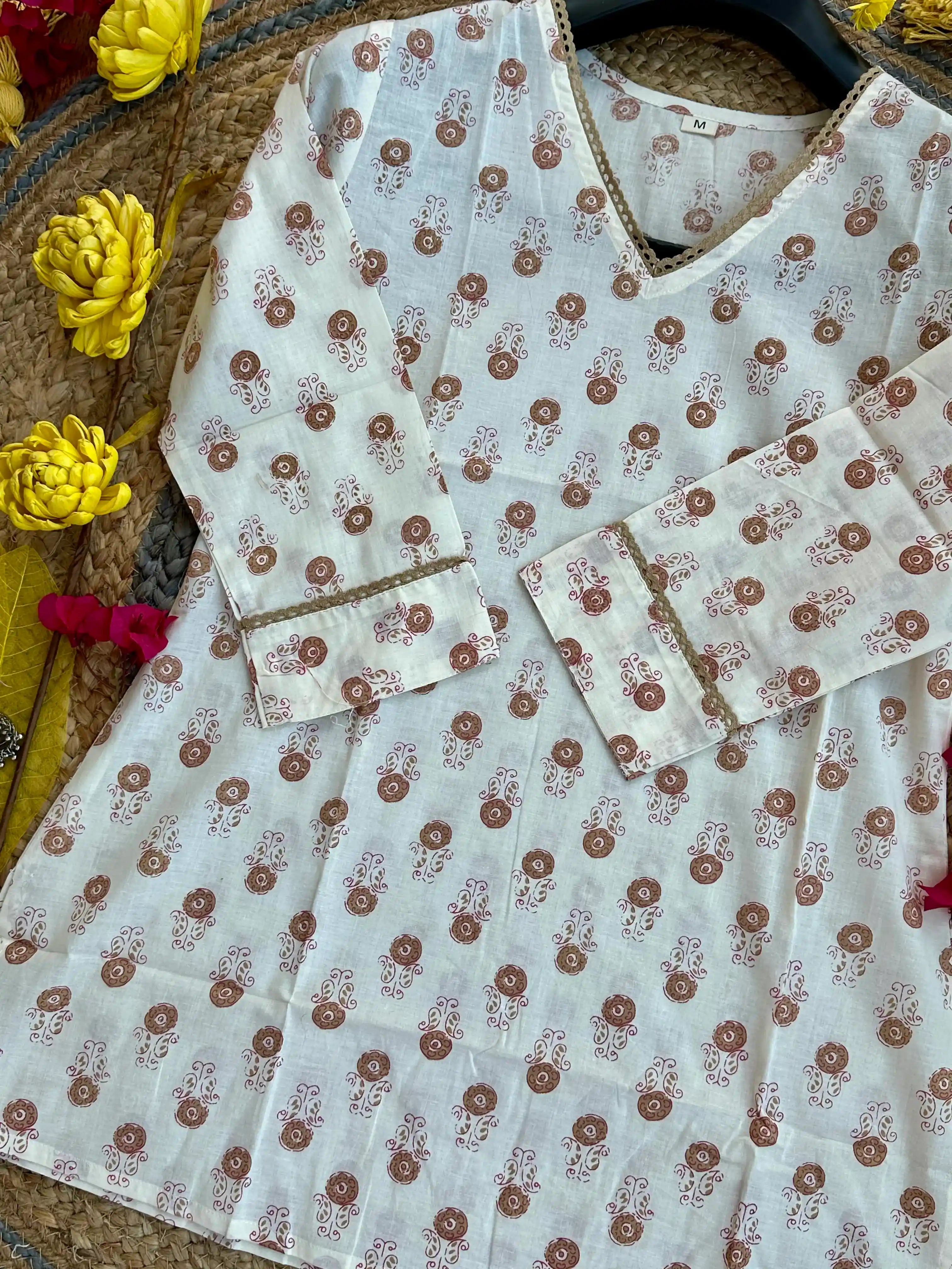 Floral Elegance: Off-White V neck Short Kurti