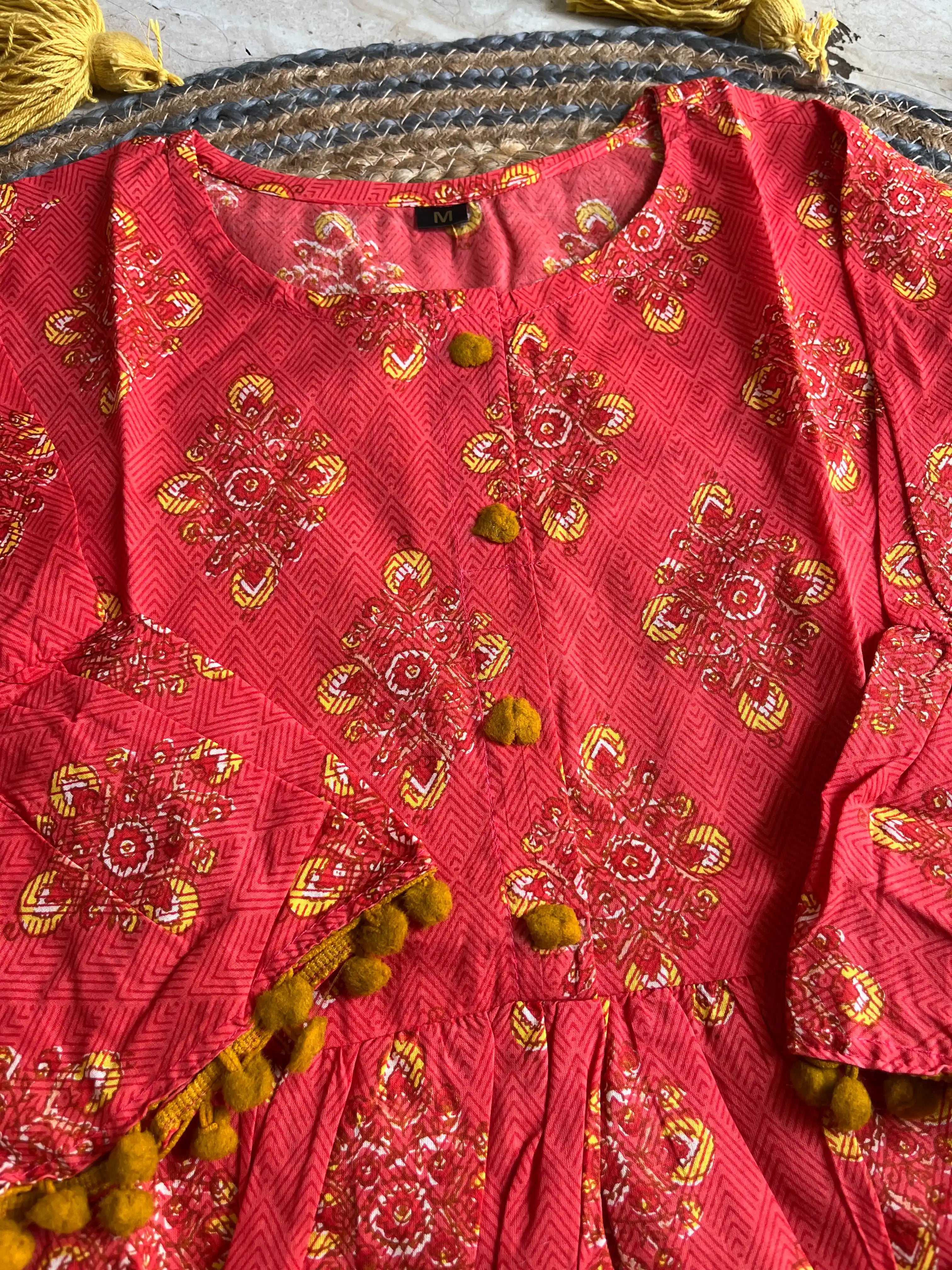 Fiery Fusion: Red Short Kurti with Vibrant Yellow Details